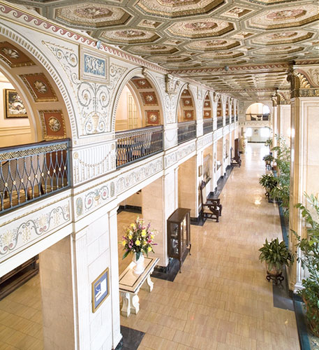 Antique styled interior decor with arcs & moldings on ceilings