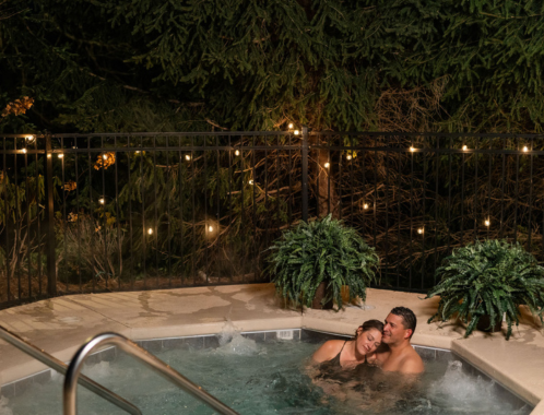 a man and woman in a hot tub