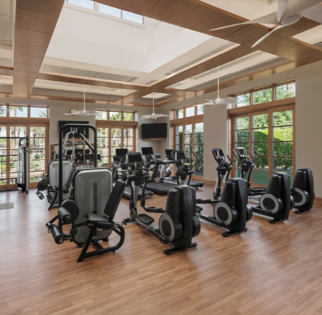 a large room with exercise equipment