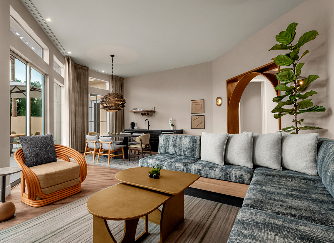 a living room with a couch and a table