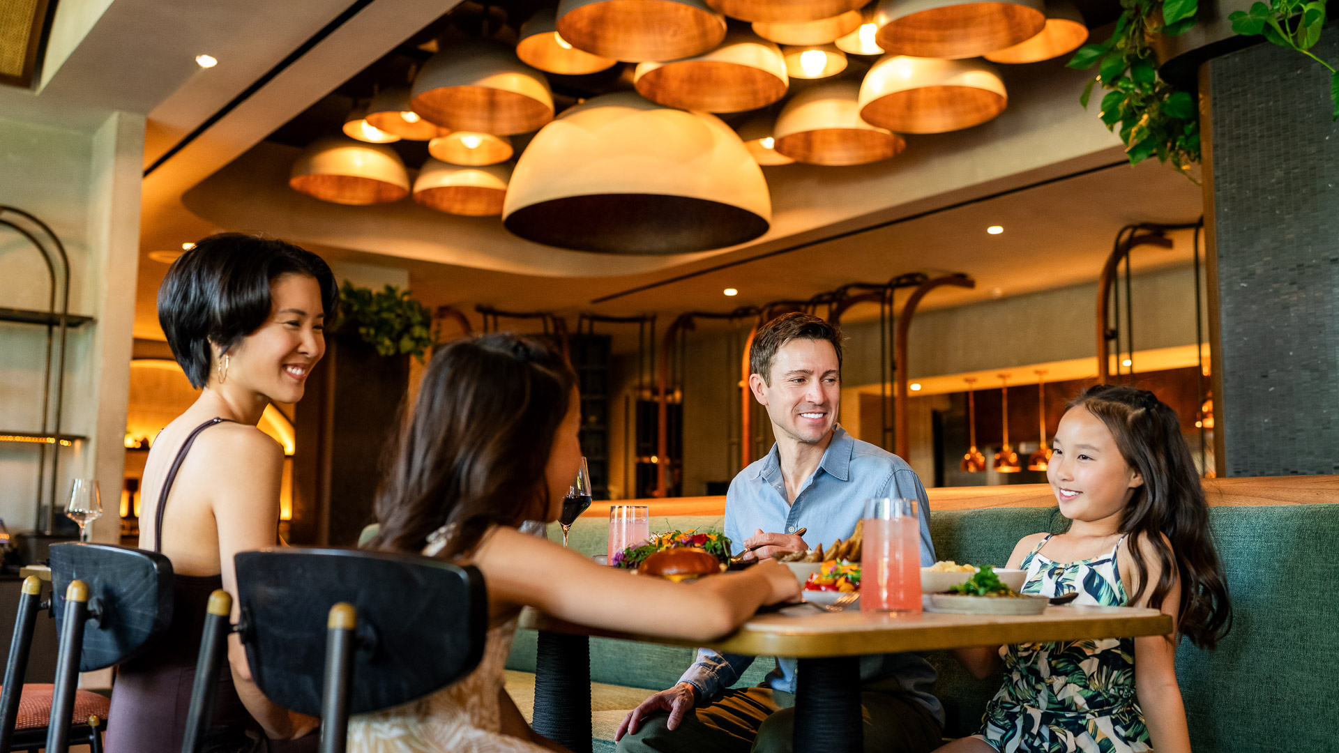 a group of people sitting at a table