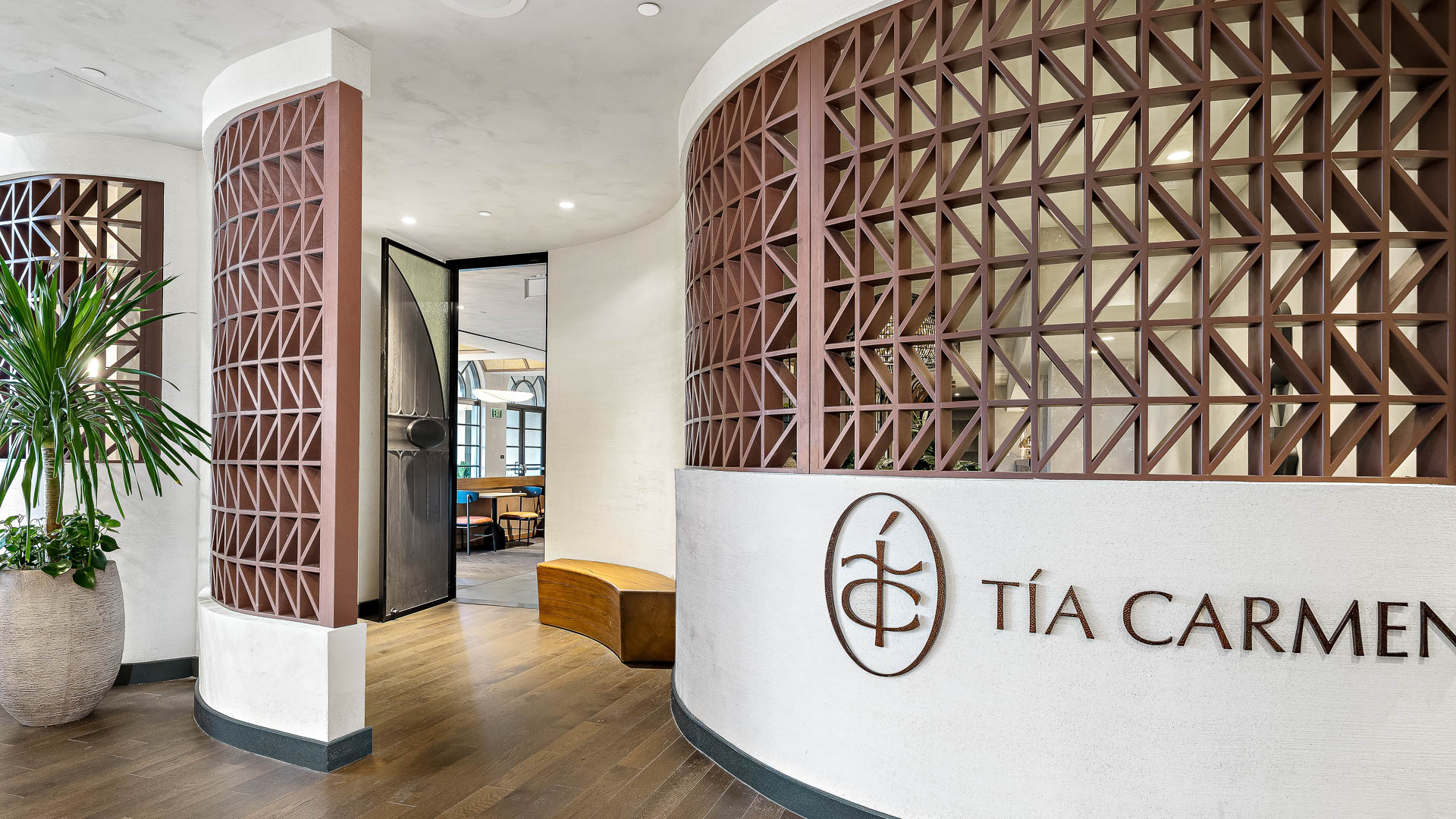 a circular wall with a logo on it