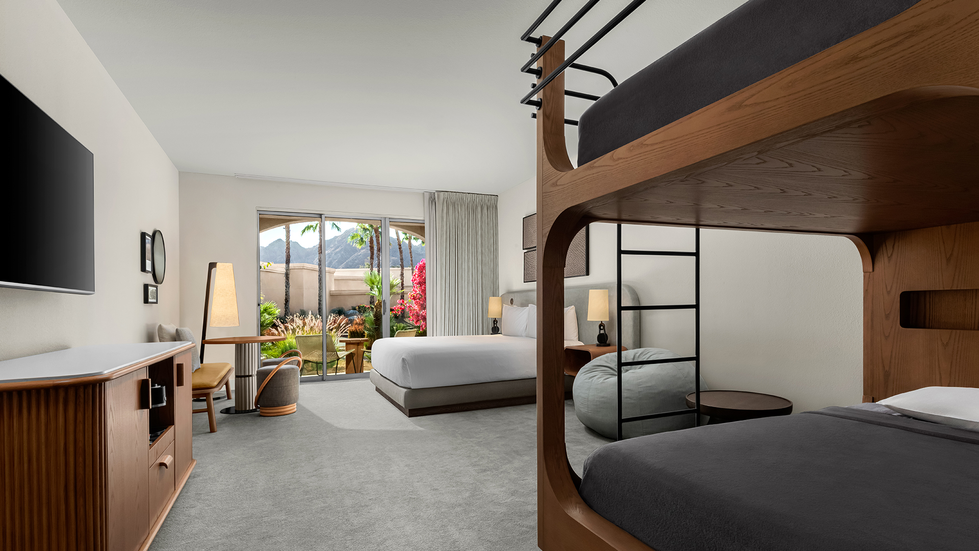 a room with bunk beds and a table