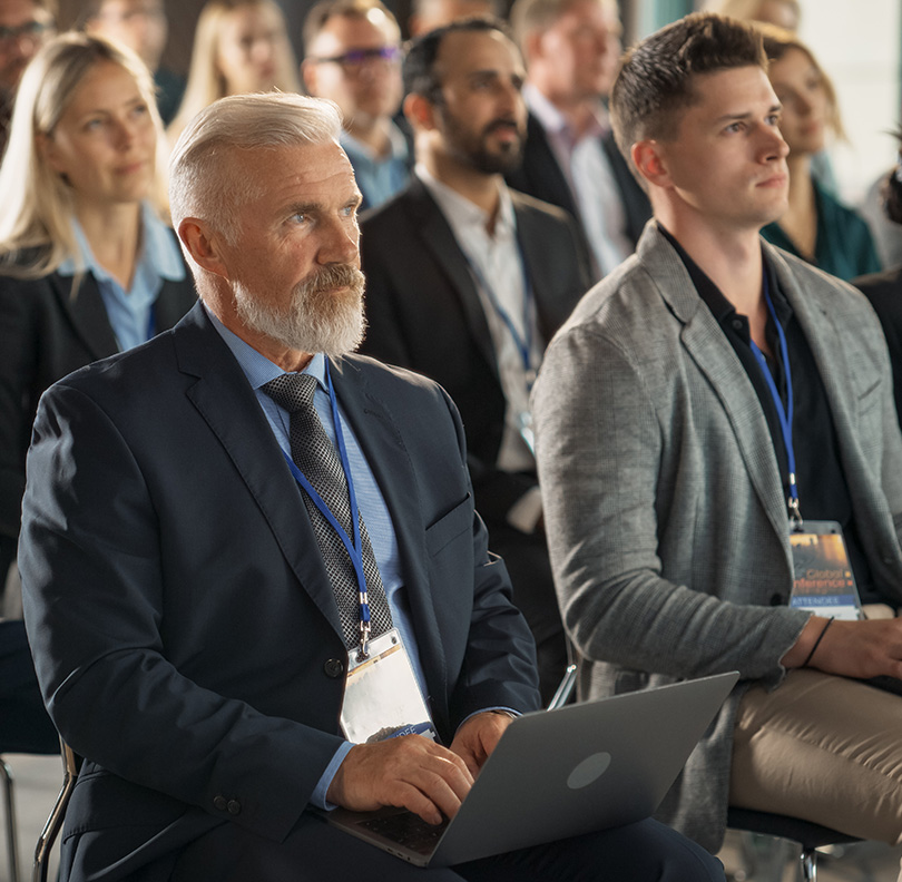 a group of people sitting in chairs