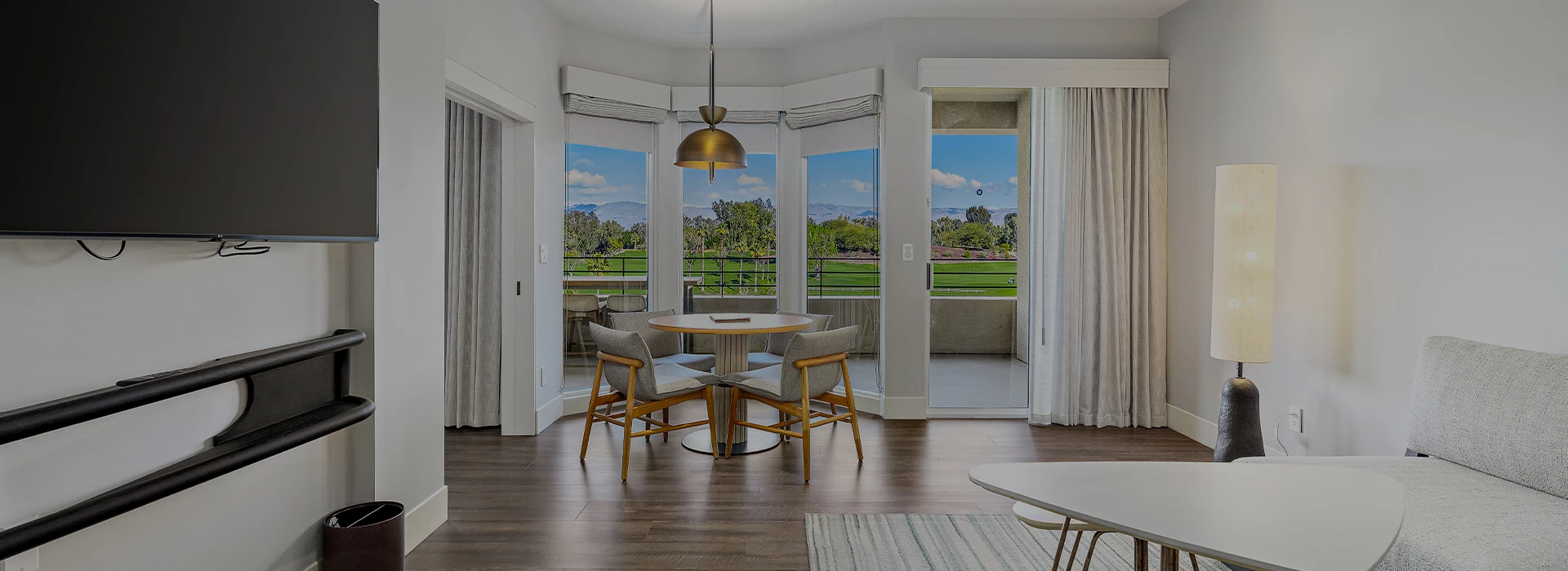 a room with a table and chairs