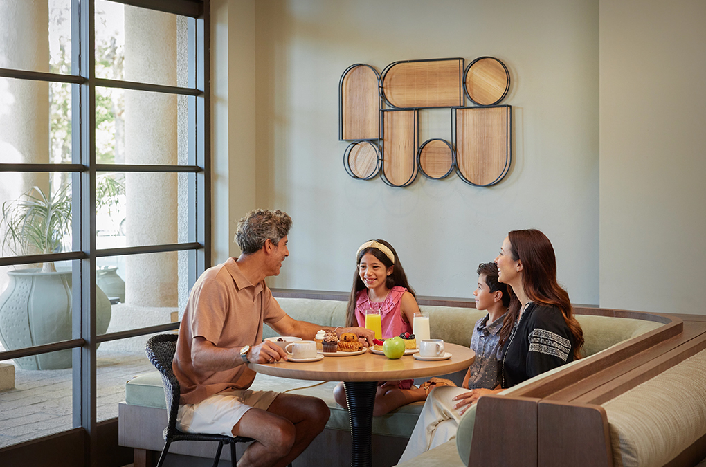 a group of people sitting at a table