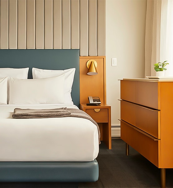 a bed with a white bed spread