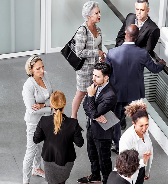 business men and women talking