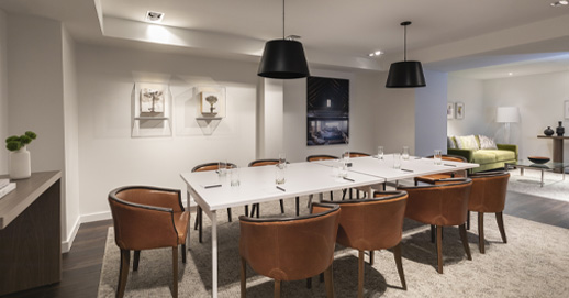 venue space with brown chairs and a rectangular table