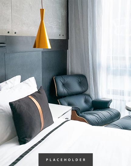 a room with a bed and a chair