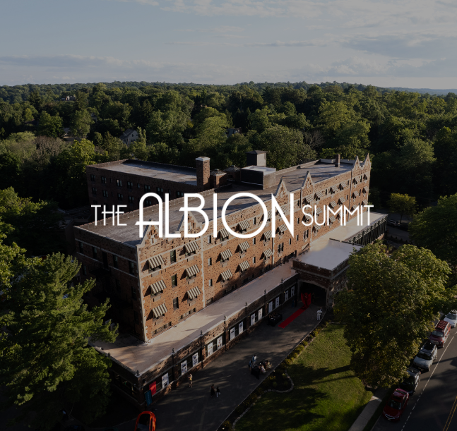 a building with trees in the background