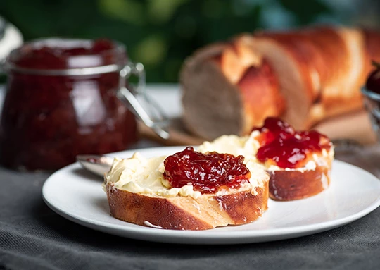 a plate of bread with jam on it