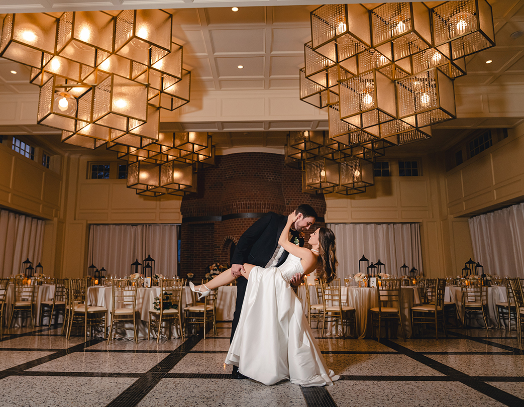 a man and woman dancing in a room