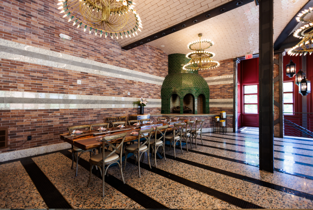 a room with a table and chairs