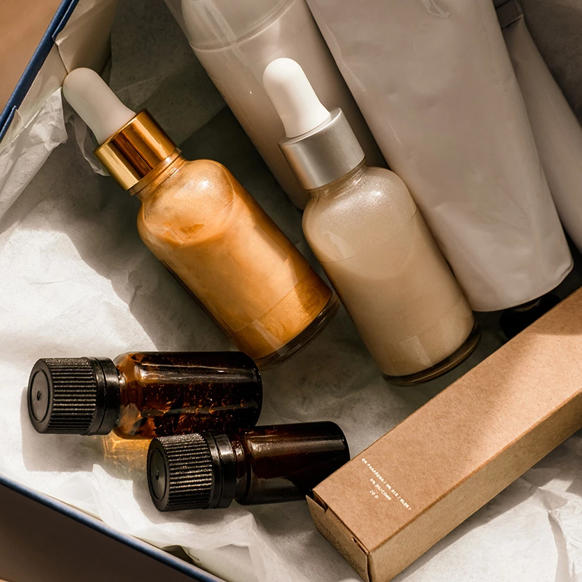 a box with bottles of liquid and a small box