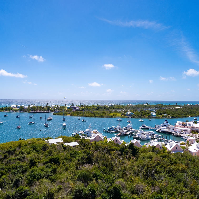 a body of water with boats and buildings