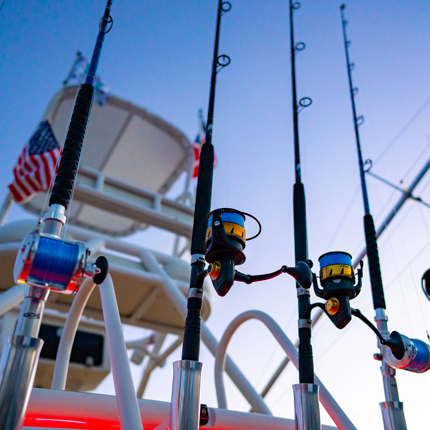 fishing rods and poles on a boat
