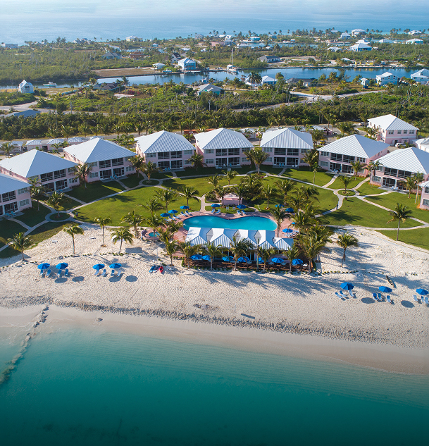 a group of buildings on a beach