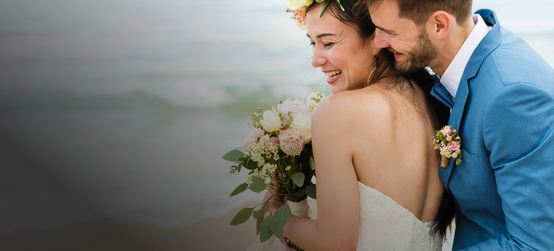 a man and woman hugging each other