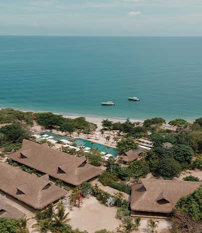 a group of buildings next to a body of water