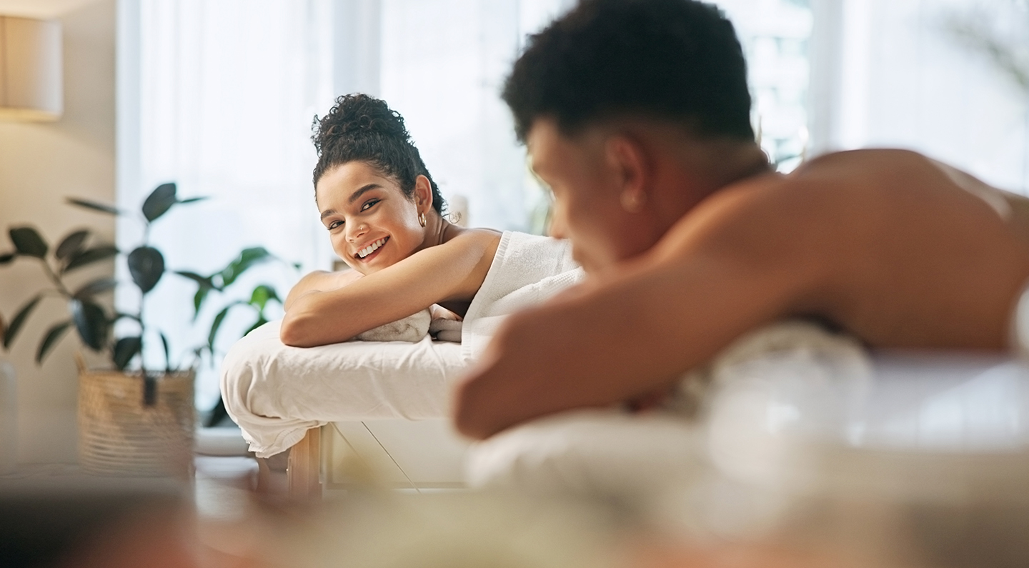 a woman lying on a massage table