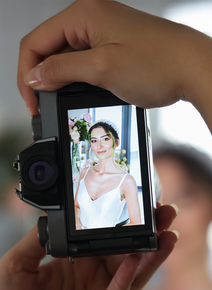 a person holding a camera