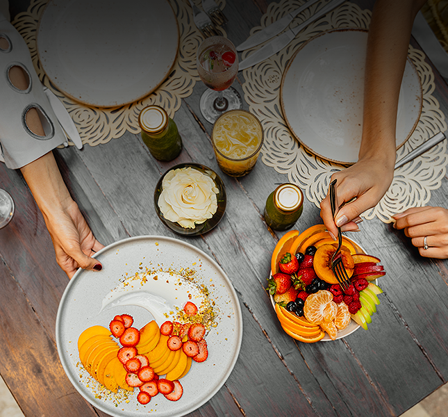 a group of people eating at a table