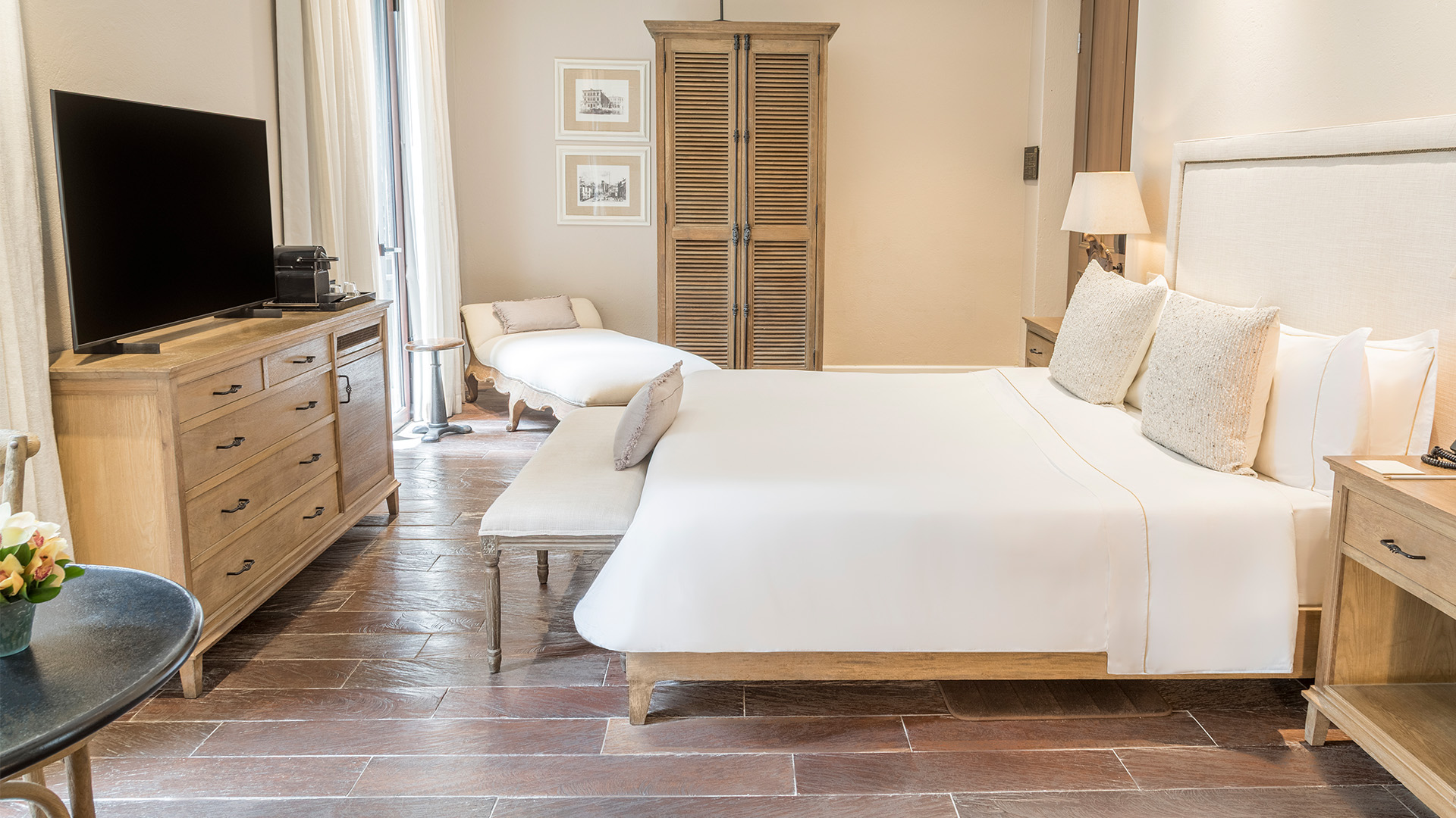 a bedroom with a bed and a dresser