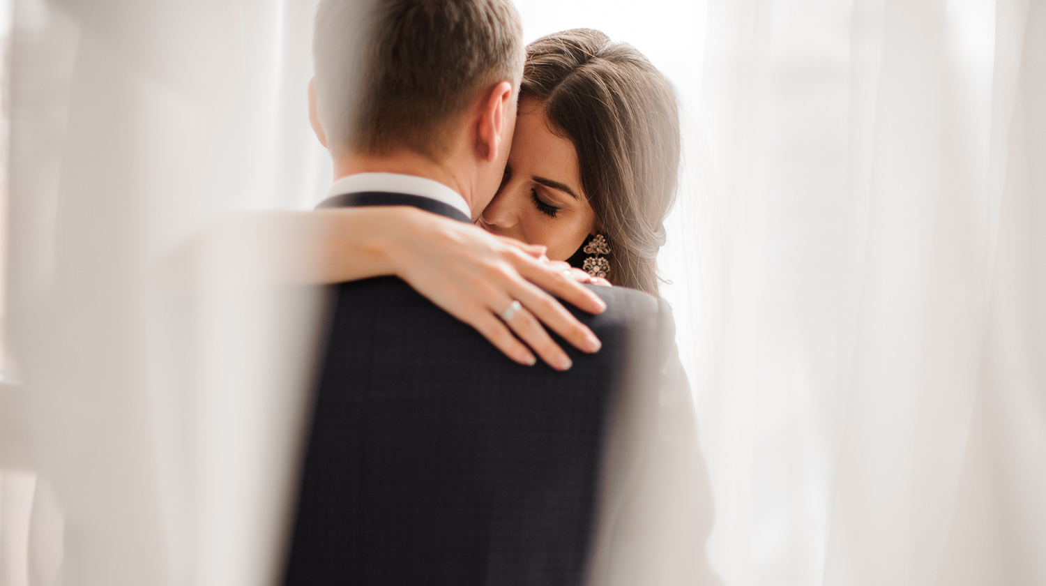 a man and woman hugging