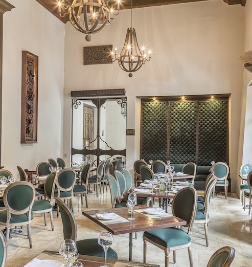 a room with tables and chairs