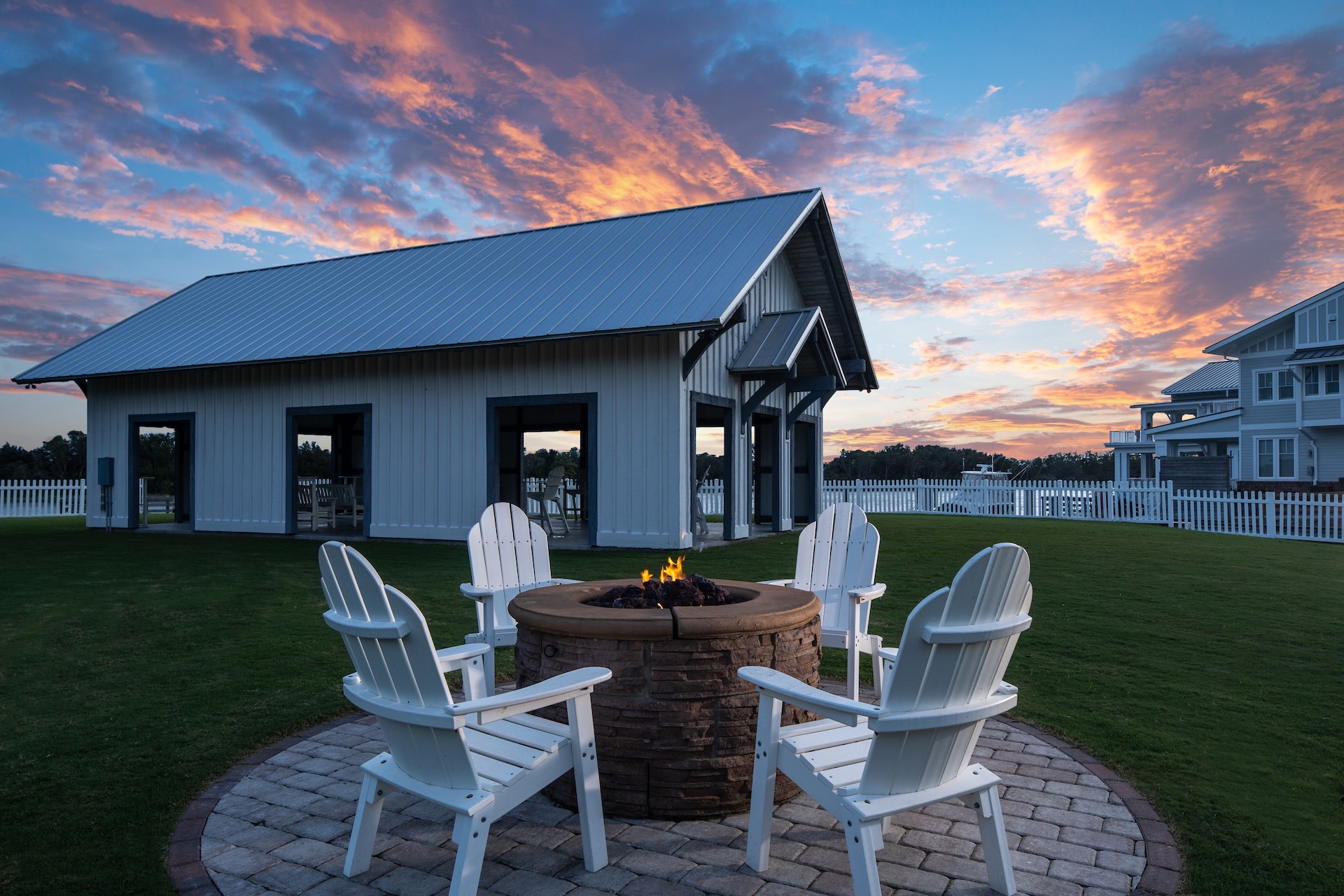 a fire pit in front of a building