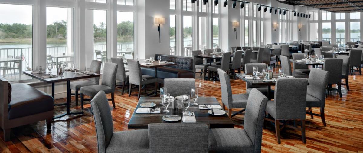 a restaurant with tables and chairs