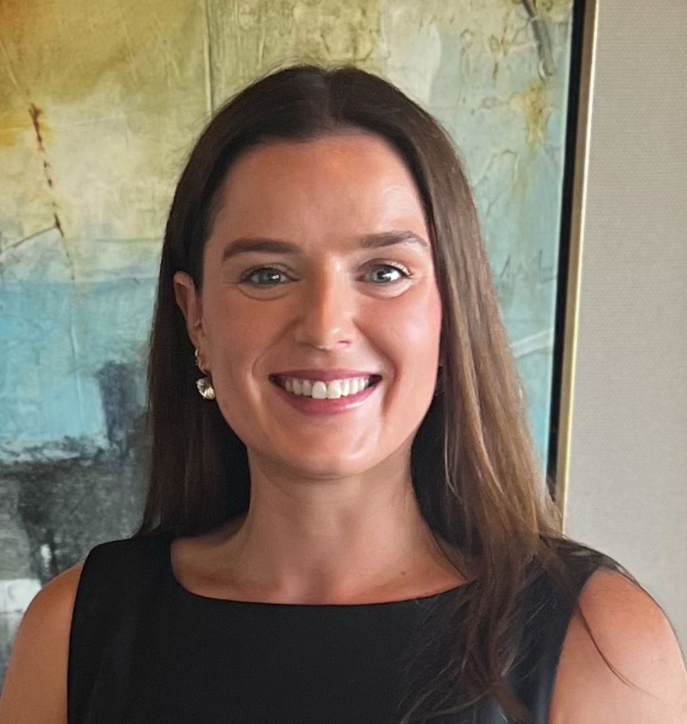 a woman smiling at camera