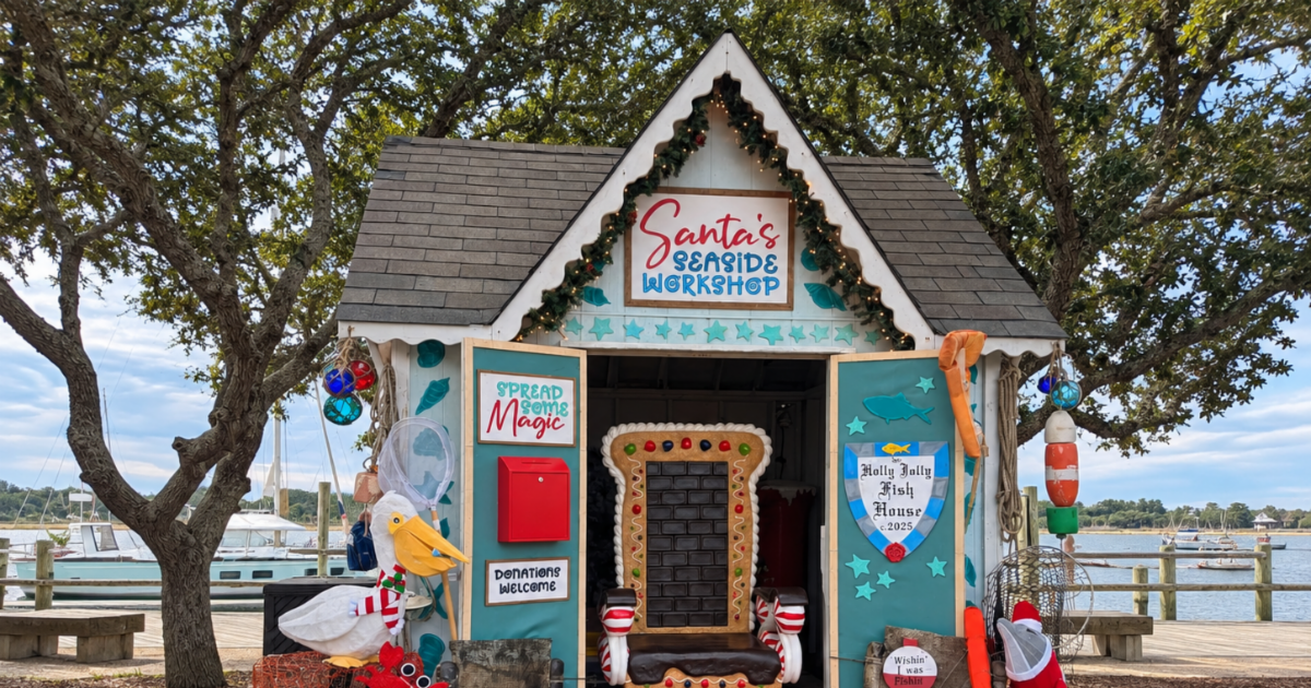 a gingerbread house with a door open