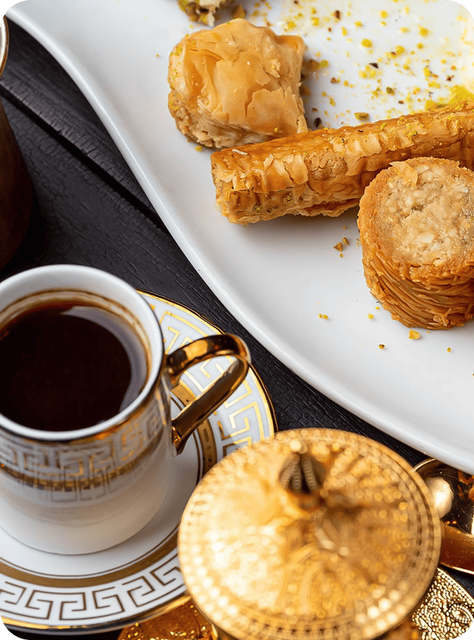 a plate of pastries and a cup of coffee