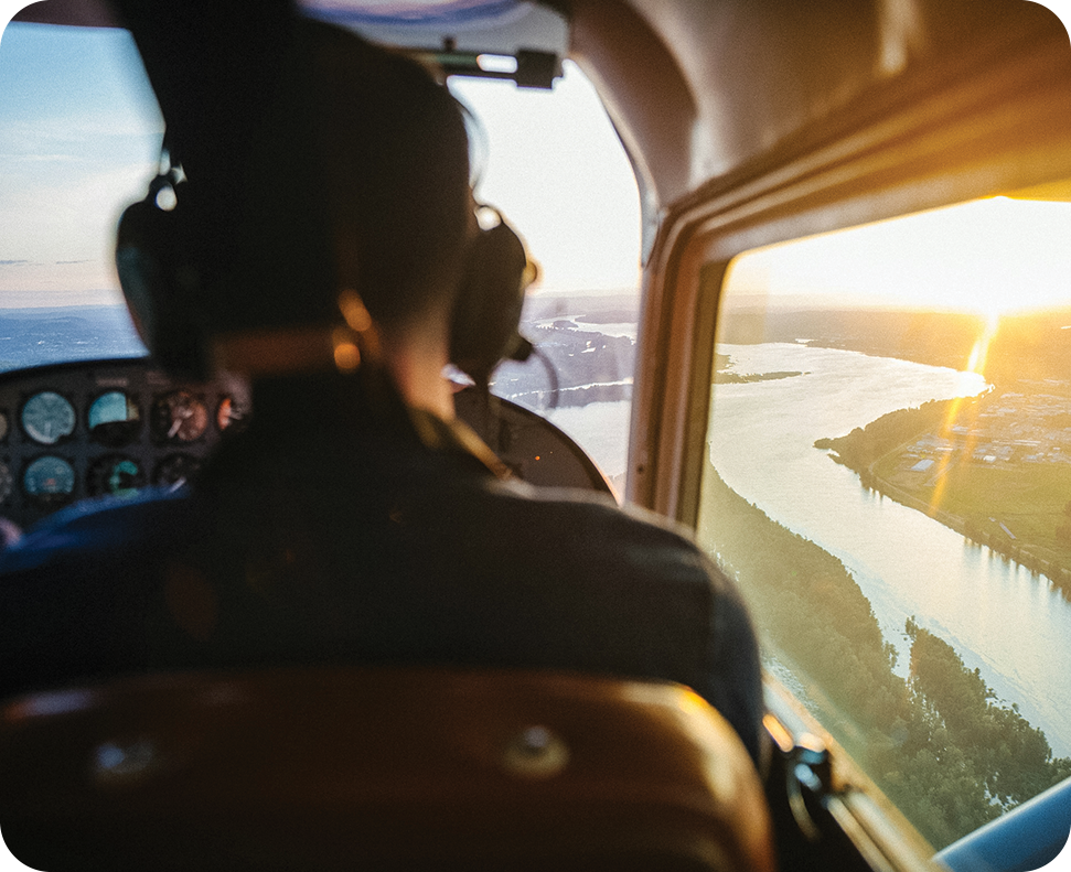 a person in a plane looking out the window