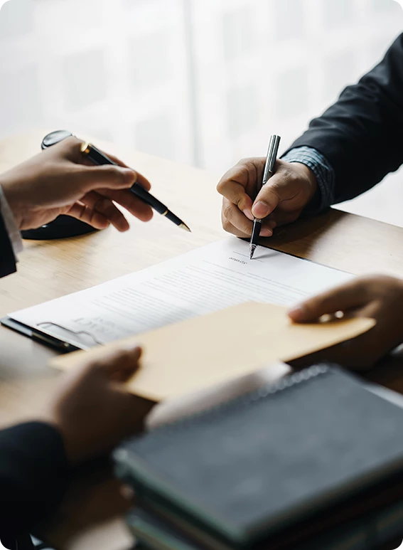 a person signing a document