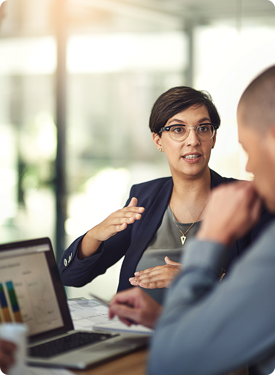 a woman talking to a man