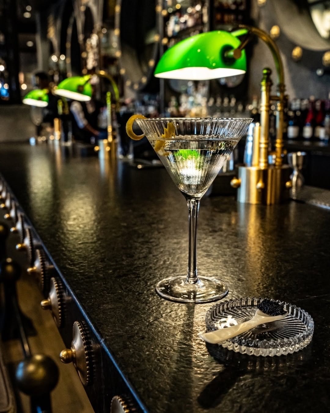 a martini glass on a bar