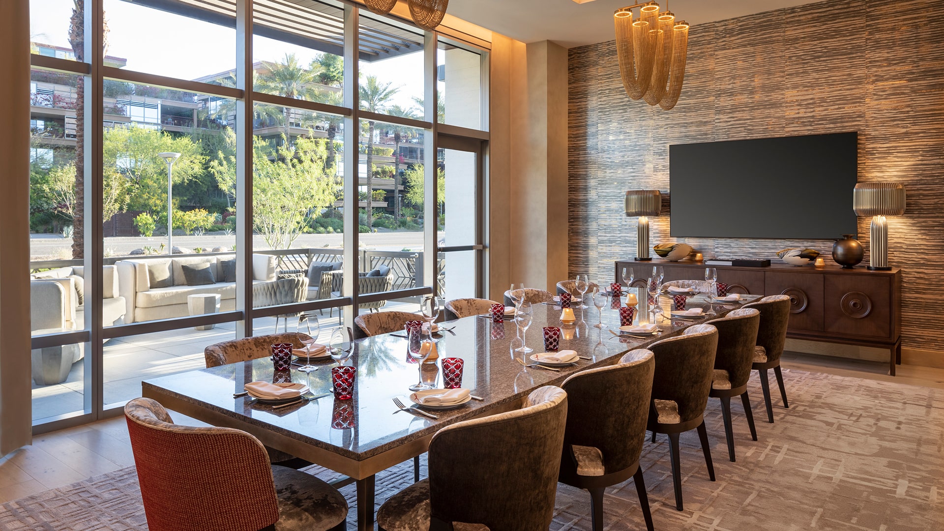 a room with a large table and chairs