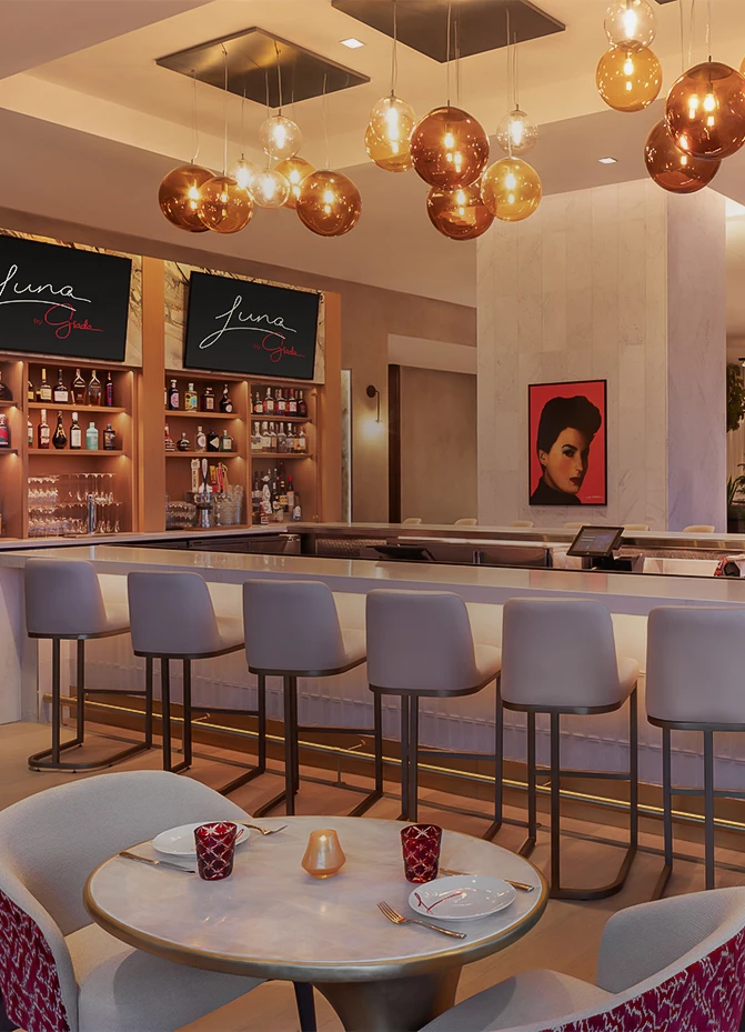 a bar with chairs and a table