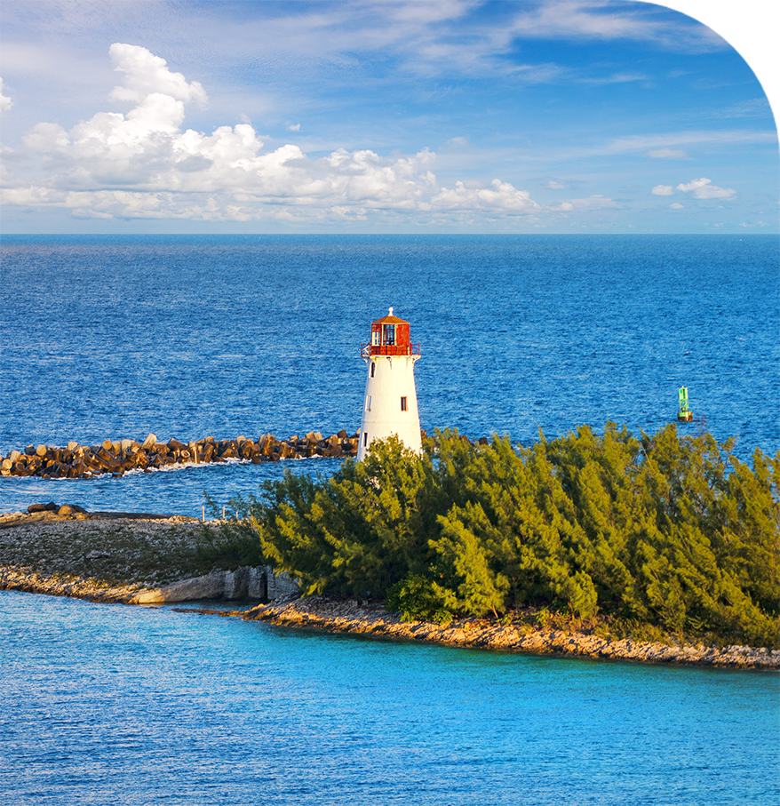 a lighthouse on an island in the water