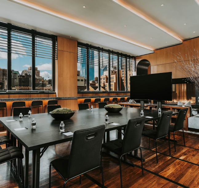 a room with a table and chairs