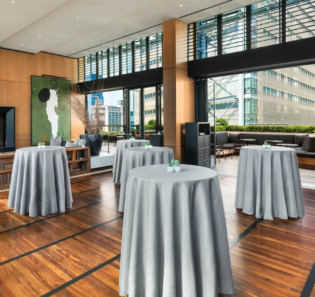 a room with tables and chairs