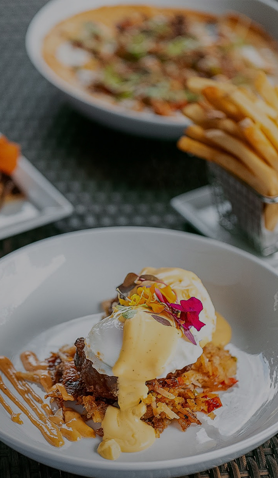 a plate of food with a side of french fries