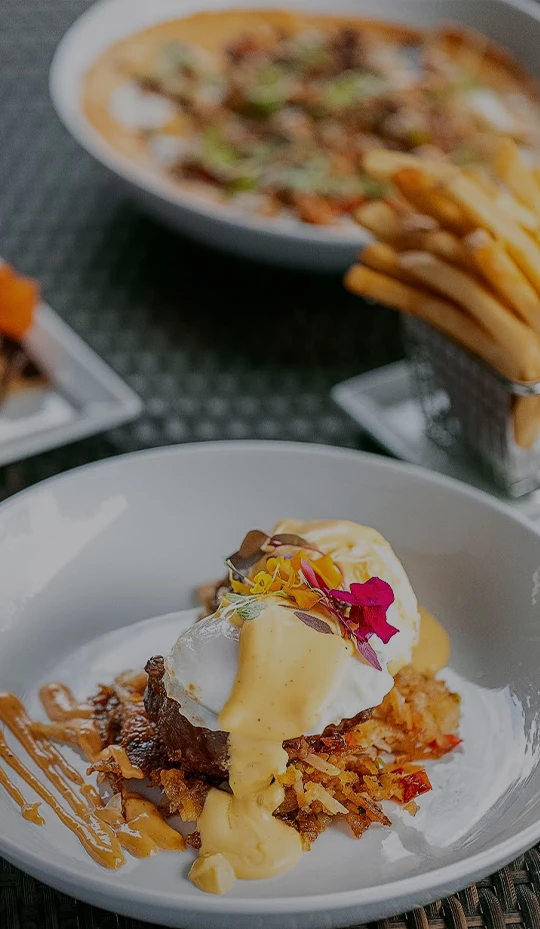 a plate of food with a side of french fries