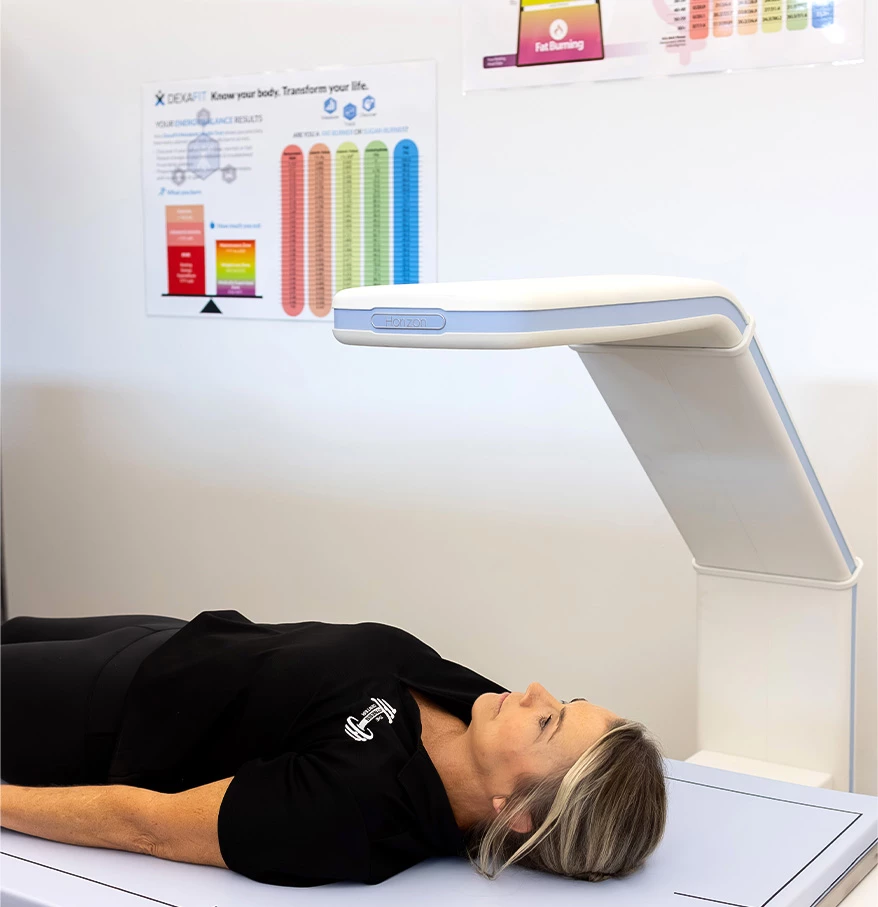 a woman lying on a medical table