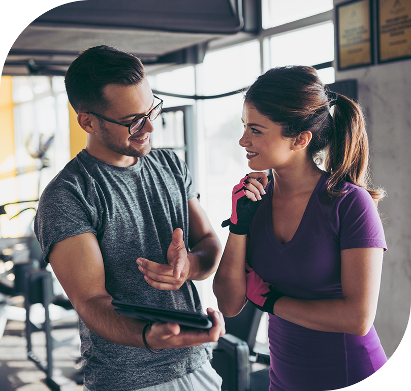 a man and woman in gym