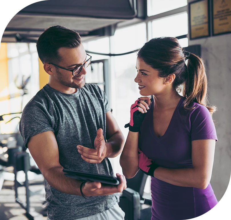 a man and woman in gym