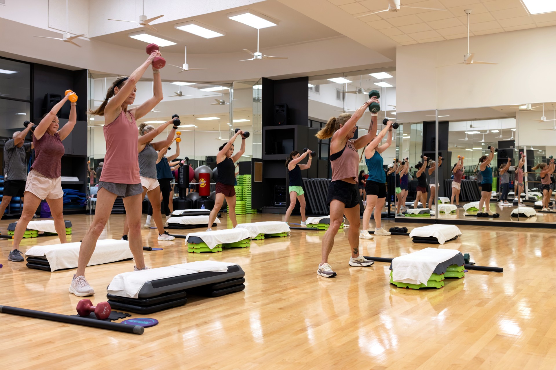 a group of people working out in a gym